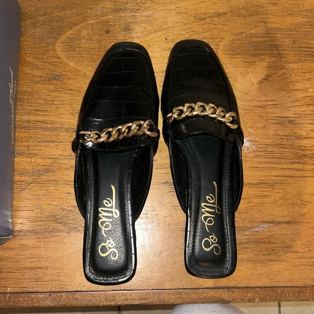 Black mules with gold metal